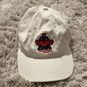 White Cap with Embroidered Cartoon Design